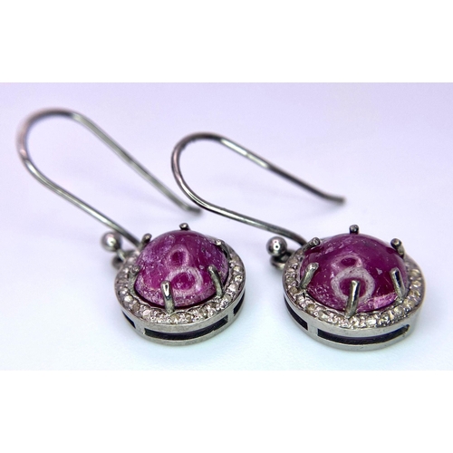 1017 - A Pair of Ruby and Diamond 925 Silver Earrings. Ruby cabochons with diamond halos. Ruby - 4ctw diamo... 