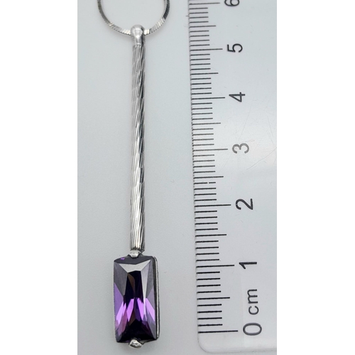 1091 - A modern 925 silver necklace with hanging pendant featuring an amethyst baguette gemstone. Pendant l... 