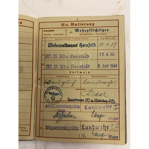 1459 - A WW2 German Army Wehrpas (documentation book)  - Dated 14th of August 1937. Includes various pieces... 