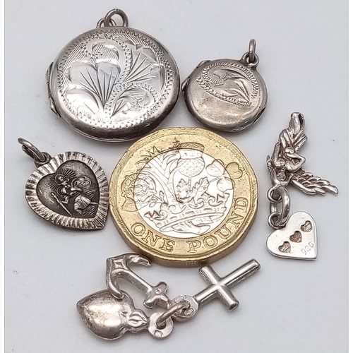 1627 - Collection of Sterling Silver Jewellery Items.
Featuring two locket pendants, three various charms/p... 