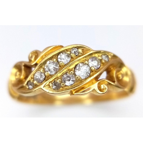 55 - A Vintage 18K Yellow Gold Diamond Wave Ring. 0.5ctw of graduated diamonds in a scrolled wave setting... 