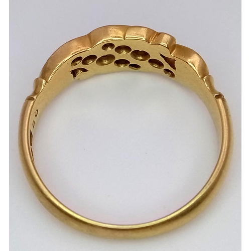 55 - A Vintage 18K Yellow Gold Diamond Wave Ring. 0.5ctw of graduated diamonds in a scrolled wave setting... 