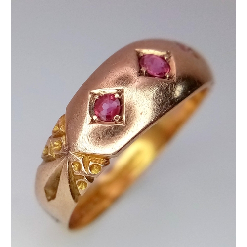 671 - An Antique 22K Yellow Gold and Ruby Ring. Three round cut rubies. Size O. 3.07g total weight.