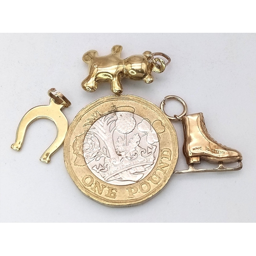 905 - A Trio of 9kt Yellow Gold Charms/Pendants.
Featuring a Horseshoe, Teddy Bear and an Ice-Skate.
Weigh... 