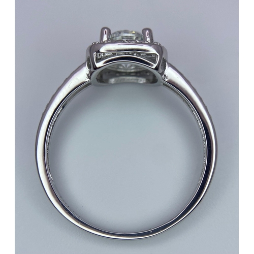 1205 - A Sterling Silver, 1.0tcw Moissanite Ring.
Size: Q
Weight: 2.41g