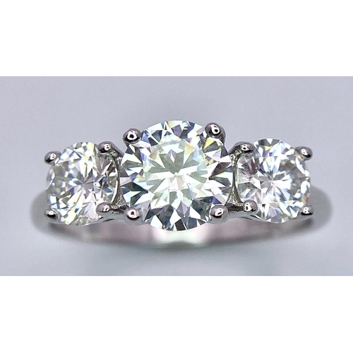 1219 - A Sterling Silver, 2.0tcw Moissanite Three Stone Ring.
Size: N
Weight: 2.35g