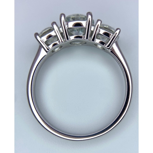 1219 - A Sterling Silver, 2.0tcw Moissanite Three Stone Ring.
Size: N
Weight: 2.35g