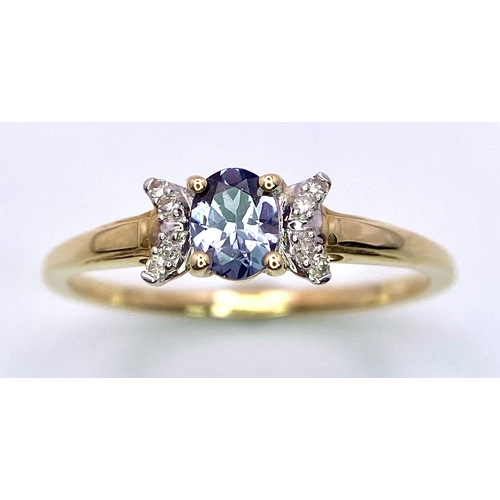 134 - A 9K Yellow Gold, Blue Spinel and Diamond Ring. Spinel - 0.36ct. Diamond - 0.040ctw. Comes with a ce... 