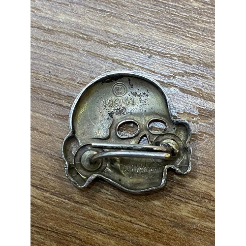 1472 - A WW2 German Waffen SS Skull Badge - Makers mark of RZM 499/41. ML549