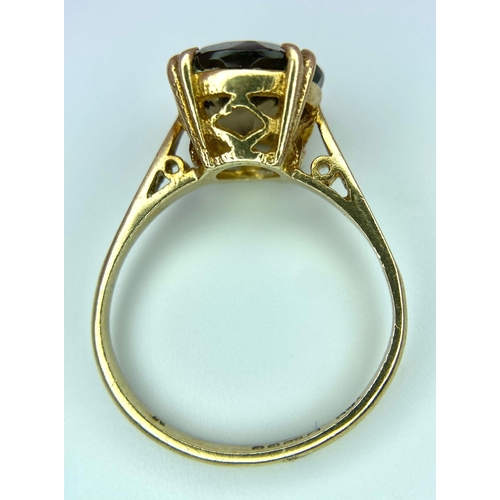 1579 - A Vintage 9K Yellow Gold Smoky Quartz Ring. Full UK Hallmarks. Round cut smoky quartz. Size O. 2.84g... 