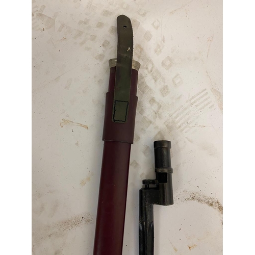 1655 - A Soviet Mosin Nagant Rifle Socket Bayonet with an Infantry Sword Scabbard. The items are not relate... 