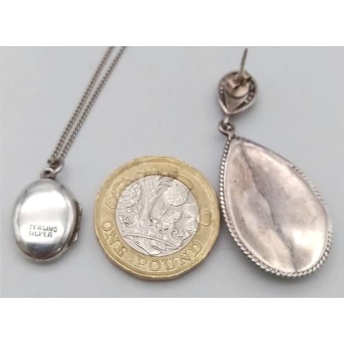 1670 - A parcel of Sterling Silver Jewellery.
Featuring a pair of tear-drop shaped drop earrings (4cm), a n... 