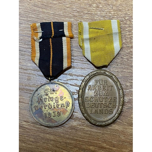 1734 - Two German WW2 Medals - War Merit and The West Wall - Both with ribbons. ML529.