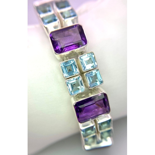 211 - A Unique, Futuristic, Amethyst and Blue Topaz Gemstone Bracelet set in 925 Silver. Ice blue squares ... 