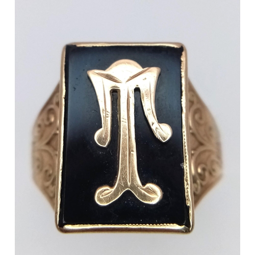 331 - A Vintage 9K Yellow Gold and Black Onyx Signet Ring. If your name or nickname (e.g. T-Bone) begins w... 