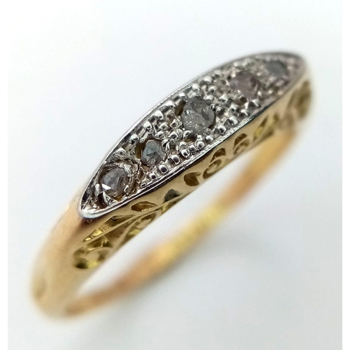 617 - A Vintage 18K Yellow Gold and Platinum Diamond Ring. Five small diamonds amongst a sea of platinum. ... 