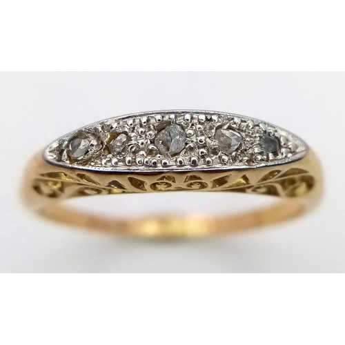 617 - A Vintage 18K Yellow Gold and Platinum Diamond Ring. Five small diamonds amongst a sea of platinum. ... 