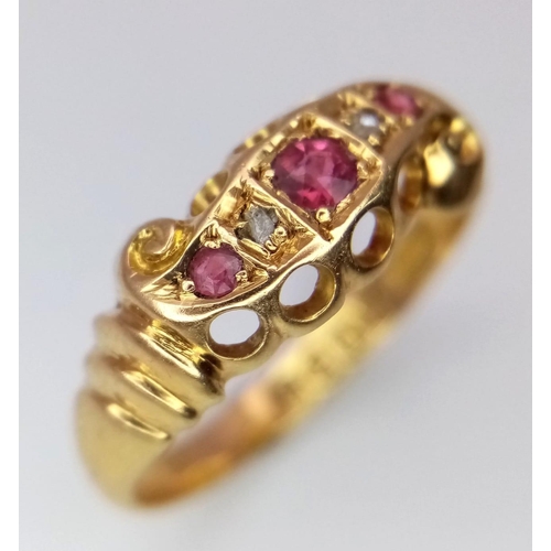 64 - A Rare Chester Hallmarked Antique 18K Yellow Gold, Ruby and Diamond Ring. Three rubies and two diamo... 