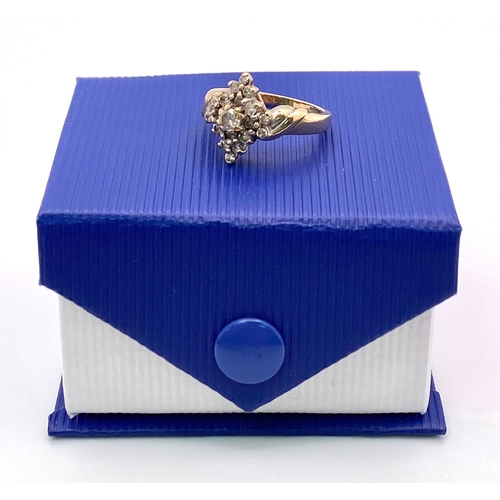 702 - 9kt Yellow Gold, Marquise Shape Diamond Cluster Ring.
Comes in box.
Size: J
Weight: 4.0g