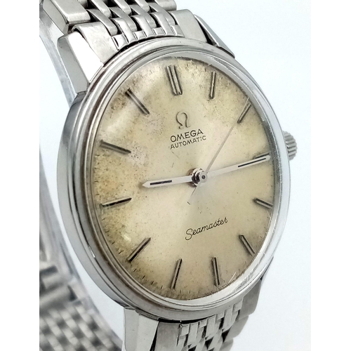 128 - A Vintage Omega (1960s) Automatic Seamaster Gents Watch. Stainless steel bracelet and case - 34mm. L... 