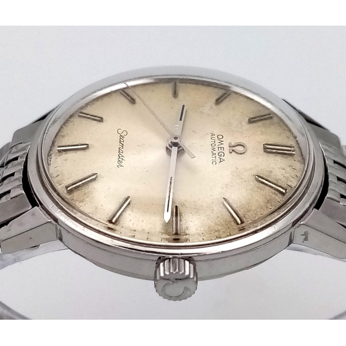 128 - A Vintage Omega (1960s) Automatic Seamaster Gents Watch. Stainless steel bracelet and case - 34mm. L... 