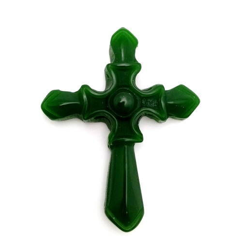 1537 - A Decorative Green Jade Cross Pendant. 5cm x 3.5cm