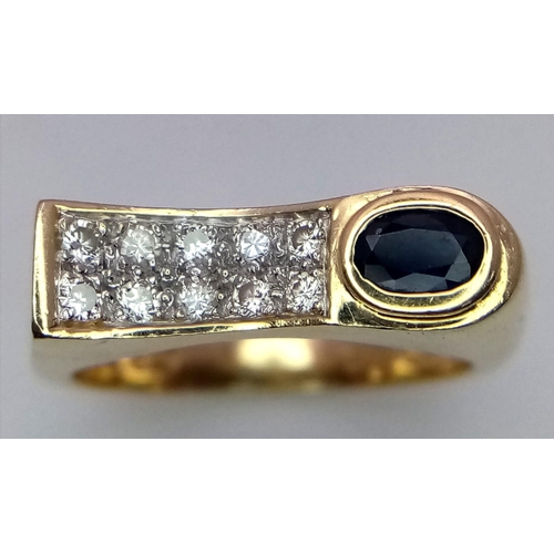 297 - A Modernistic 14k Yellow Gold, Sapphire and Diamond Ring. Oval sapphire and 0.20ctw of diamonds. Siz... 