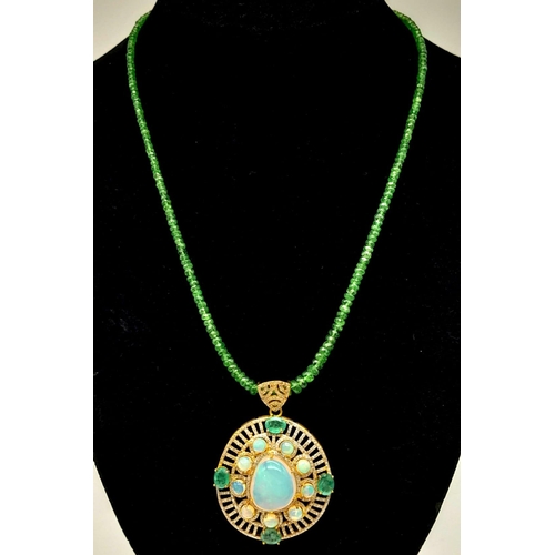 72 - A Fancy Opal, Diamond and Emerald Pendant with a Detachable Green Garnet Necklace. Centre opal with ... 