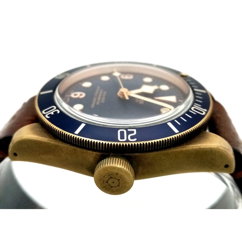 766 - A TUDOR CHRONOMETER GENTS WRISTWATCH WITH BLUE DIAL AND MATCHING BEZEL .  44mm    14758