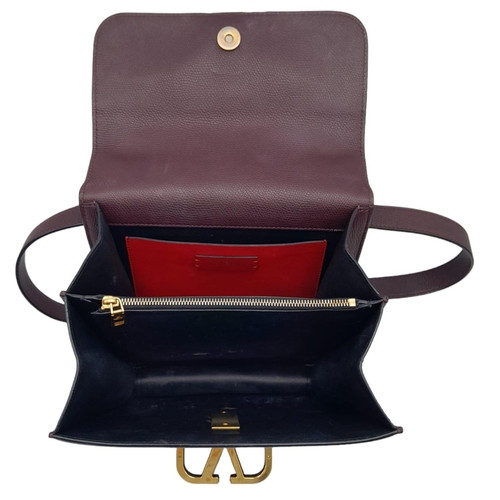 1194 - A Valentino Garavani VSLING shoulder Bag in Soft Burgundy Calfskin. Nappa Leather Interior With Cent... 