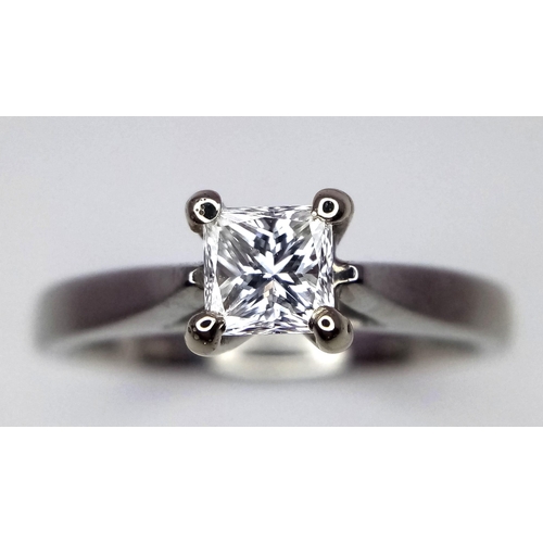 1275 - A platinum diamond solitaire ring with a wonderful princess cut diamond (0.43 carats) carrying a Bri... 