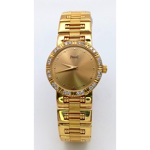 717 - A STUNNING PIAGET 18K GOLD LADIES DRESS WATCH WITH DIAMOND BEZEL , QUARTZ MOVEMENT . GOLDTONE DIAL A... 