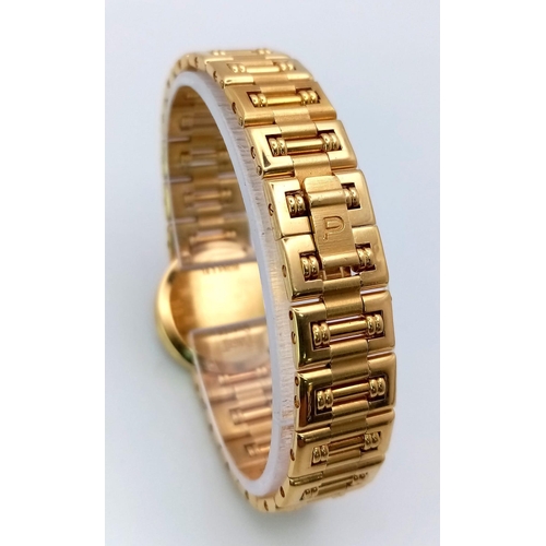 717 - A STUNNING PIAGET 18K GOLD LADIES DRESS WATCH WITH DIAMOND BEZEL , QUARTZ MOVEMENT . GOLDTONE DIAL A... 