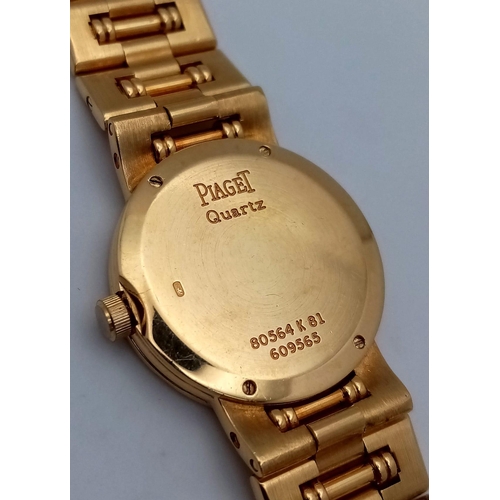 717 - A STUNNING PIAGET 18K GOLD LADIES DRESS WATCH WITH DIAMOND BEZEL , QUARTZ MOVEMENT . GOLDTONE DIAL A... 