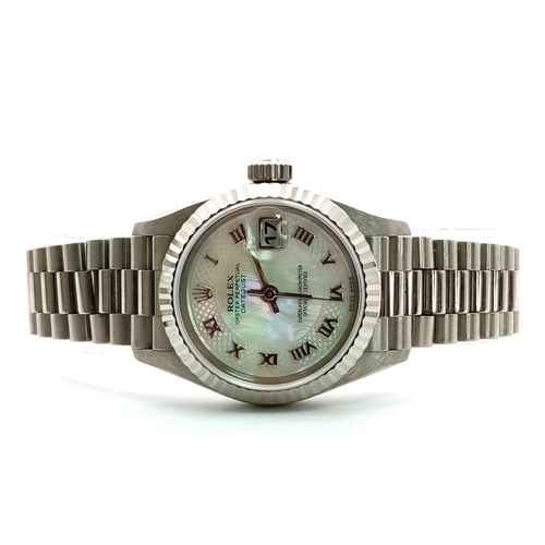 612 - A LADIES ROLEX 18K WHITE GOLD OYSTER PERPETUAL DATEJUST WITH UNUSUAL PATTERNED DIAL , ROMAN NUMERALS... 