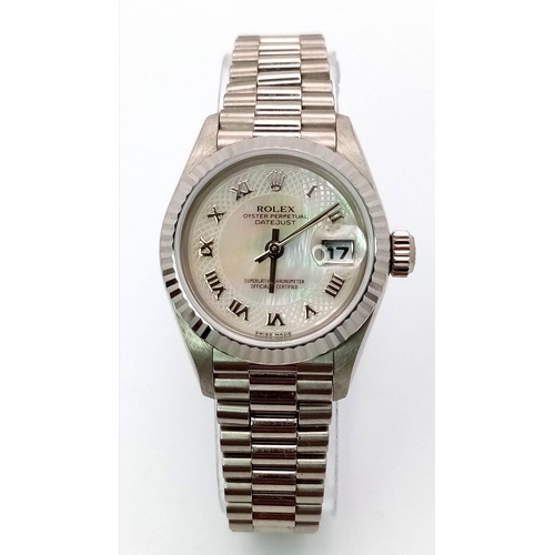 612 - A LADIES ROLEX 18K WHITE GOLD OYSTER PERPETUAL DATEJUST WITH UNUSUAL PATTERNED DIAL , ROMAN NUMERALS... 