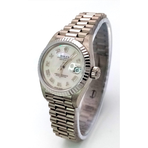 612 - A LADIES ROLEX 18K WHITE GOLD OYSTER PERPETUAL DATEJUST WITH UNUSUAL PATTERNED DIAL , ROMAN NUMERALS... 