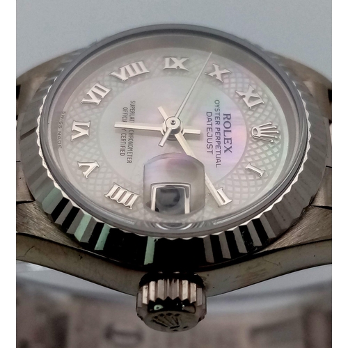 612 - A LADIES ROLEX 18K WHITE GOLD OYSTER PERPETUAL DATEJUST WITH UNUSUAL PATTERNED DIAL , ROMAN NUMERALS... 