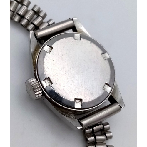 1127 - A vintage Tissot Ladies Quartz Watch. Stainless Steel, 19.5mm diameter, not currently in working ord... 