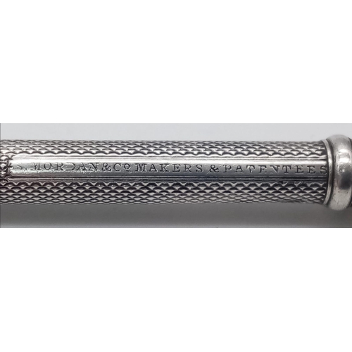 1198 - SAMPSON MORDAN & CO (1830-1845) Sliding Silver Propelling Pencil. 
A mid 19th century silver pencil ... 