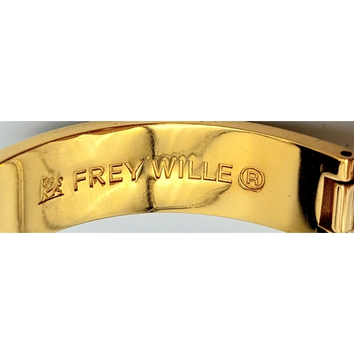 133 - A rare and beautiful FREY WILLE lavishly gold-plated watch in the fashion of Egyptian Revival. Case:... 