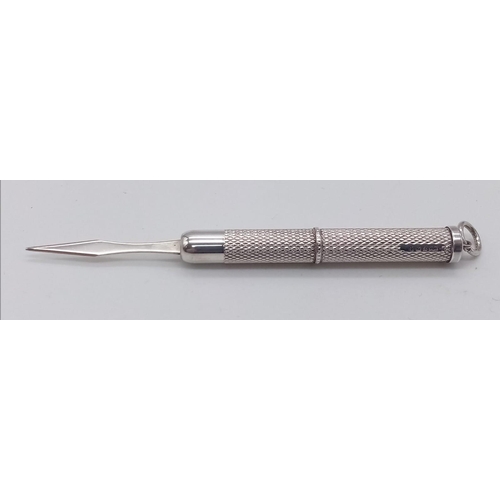 1602 - 1984, Birmingham Sterling Silver, Retractable Toothpick.
It features a smooth twist action for openi... 