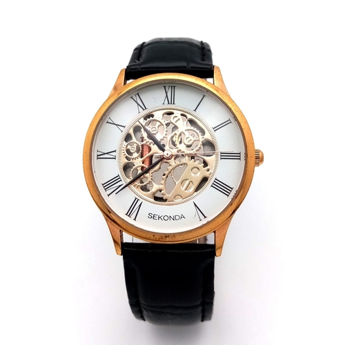 1648 - A Sekonda Automatic Skeleton Gents Watch. Black leather strap. Gilded case - 37mm. Skeleton dial. In... 