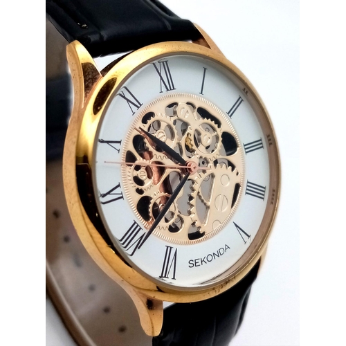 1648 - A Sekonda Automatic Skeleton Gents Watch. Black leather strap. Gilded case - 37mm. Skeleton dial. In... 