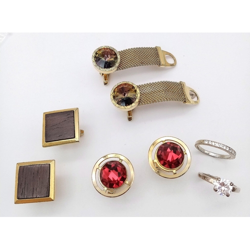 1776 - A parcel of white metal jewellery items.
Featuring three pairs of Gold Tone Fancy Cuff-Links and two... 