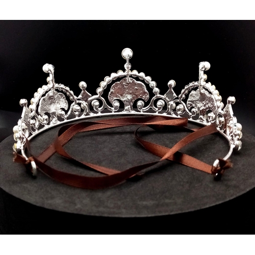 210 - An exact replica of the latest tiara, made for Kate Middleton, Duchess of Cambridge, to much her sty... 