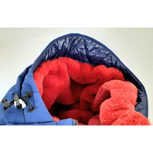 255 - A Ladies Moncler Winter Jacket, Royal Blue Body With A Red Faux Fur Hood, Size UK 8/10, Very good Co... 