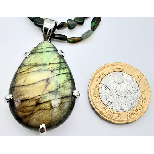 540 - A Labradorite Pendant on a Two-Row  Opal bead Necklace. Finished with a colour-play opal and diamond... 