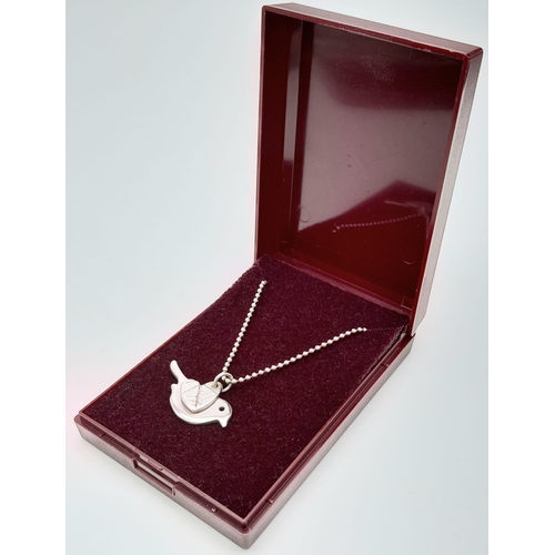 693 - A 0.999 Full Silver Bird Pendant on a 925 Silver Chain. Bird Length 23mm, Chain Length 19cm, Total w... 