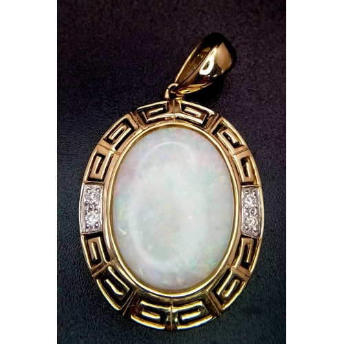 749 - A 14k Yellow Gold and Opal Pendant, featuring two small diamonds on each side, Opal dimensions: 20mm... 